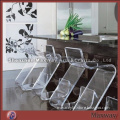 Heat formed clear acrylic furniture chair with a low back and foot rest